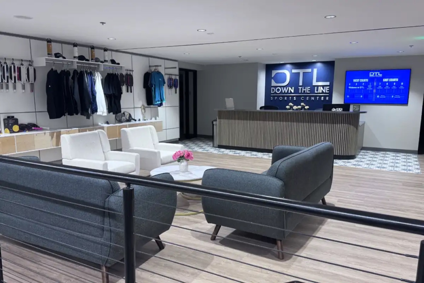 The Down the Line Sports Center lobby, pro shop, and check-in desk